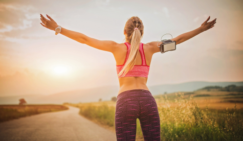 woman stretching during a run image